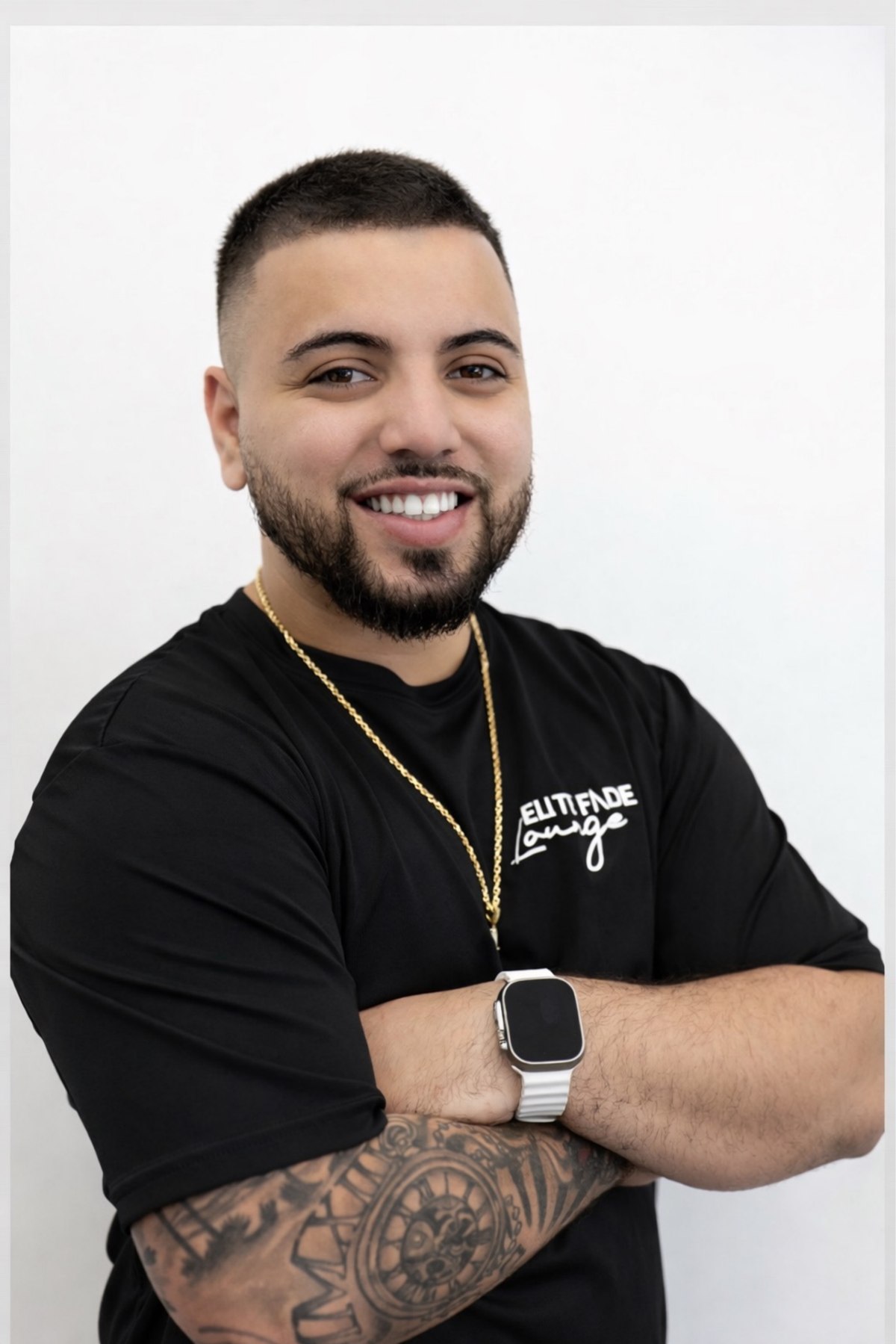 Jonathan Santiago, barber at Elite Fade Lounge, aka Suave